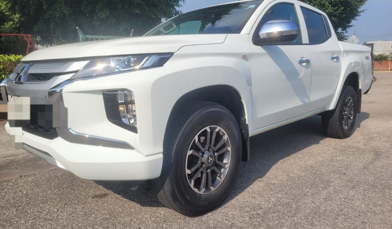 MITSUBISHI SEMINUEVA L200 4X4 DIESEL GLX 2023 lleno